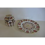 A Royal Crown Derby scallop edge plate and a lidded jar, pattern 1128, both in good condition