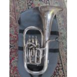 A Boosey and co ltd large bore Solbron Class A tuba 133784 with soft case, some multiple denting