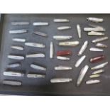 A collection of 36 fruit knives including 29 silver and silver bladed knives, dating from the late