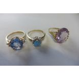 Three hallmarked 9ct gold rings - approx 8.4 grams