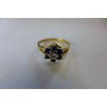 An 18ct gold diamond and sapphire ring, approx 3.6 grams, size M, some wear but generally good