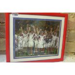 A framed England 2003 Rugby World Cup winners photo, signed by Johnson, Wilkinson, Dawson, Catt,