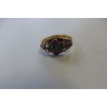 A 15ct hallmarked Suffragette ring, size P, approx 2.4 grams, hallmarks clear, some slight bending