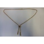 An 18ct gold box link tassel necklace, stamped 750 and Italian hallmark, length 47cm, weight