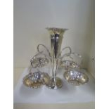 A silver four basket epergne, with weighted centre section, Birmingham 1911/12 A and JZ maker,