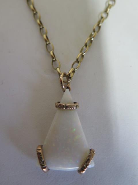 A large triangular section of white opal, 30mm x 20mm, T bar frame with circlet clasps - stamped - Image 2 of 3