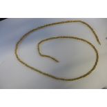 A heavy gold filigree bead necklace, length 90cm, no British hallmarks, stamped 750 but tests as