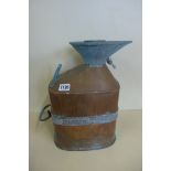 A two gallon Burgh of Ardrie copper pump measure
