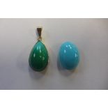 A gold and turquoise tear drop pendant, the gold is not hallmarked but tests to 18ct, the stone is a