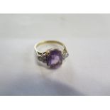 An 18ct yellow gold amethyst and diamond ring, size P, amethyst approx 12x8mm, approx 4.5 grams,