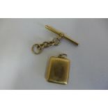 An 18ct locket, marked 18ct, approx 10 grams, and an 18ct part watch chain, each link hallmarked,
