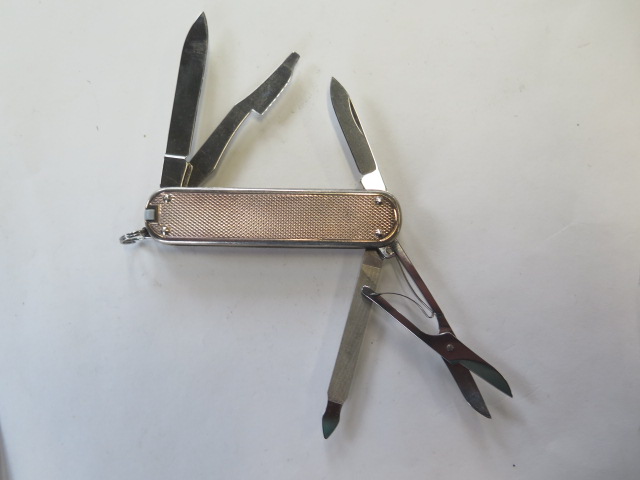 A silver Victorinox penknife, two blades, scissors and two other attachments, generally good, some - Image 3 of 3