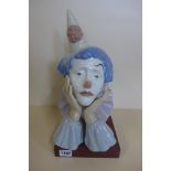 A Lladro clowns head on stand, good condition, 35cm tall