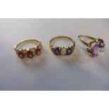 Three hallmarked 9ct gold rings - approx 6 grams