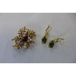 A 9ct gold brooch and a pair of 9ct earrings, total weight approx 7 grams