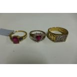 Three hallmarked 9ct yellow gold rings, sizes N and T, total approx weight 9.6 grams, in good