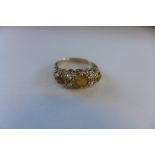 A hallmarked 9ct ring, set with citrine and seed pearls with ornate pierced setting, size K,