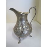 A Victorian embossed silver cream jug - 1847 - makers mark rubbed, height 23.5cm weight 4.7 troy
