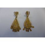 A pair of gold filigree drop earrings, Iranian made and stamped 750 - tested as 18ct gold, weight