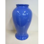 A large Moorcroft powder blue vase, 42cm tall, with museum label, generally good