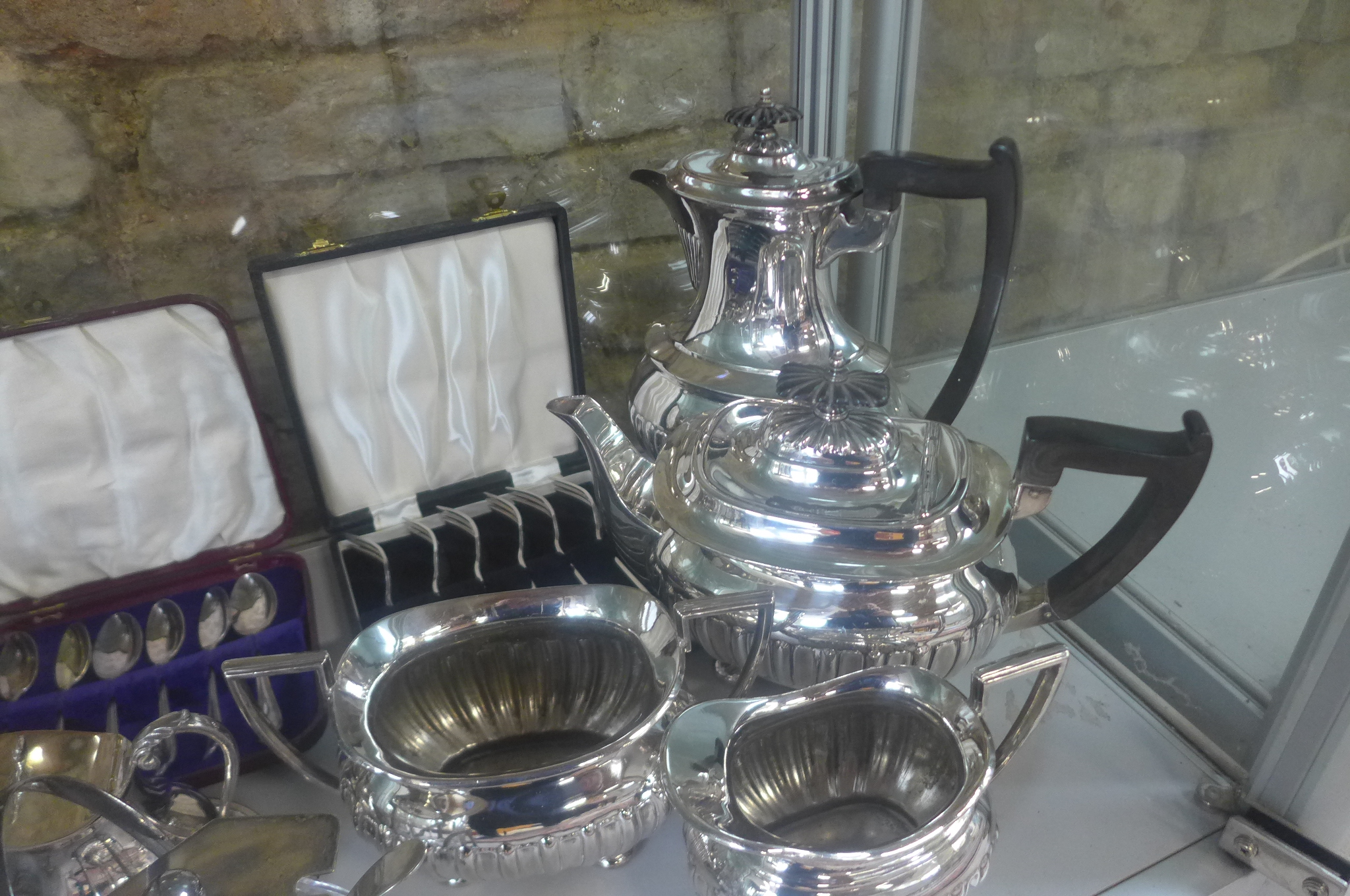 A collection of silver plated items, to include a four piece Walker and Hall tea set - some wear and - Image 2 of 4