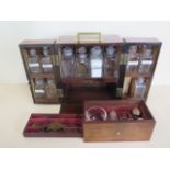 A good early 19th century brass mounted mahogany apothecary chest, fitted with eleven glass jars,
