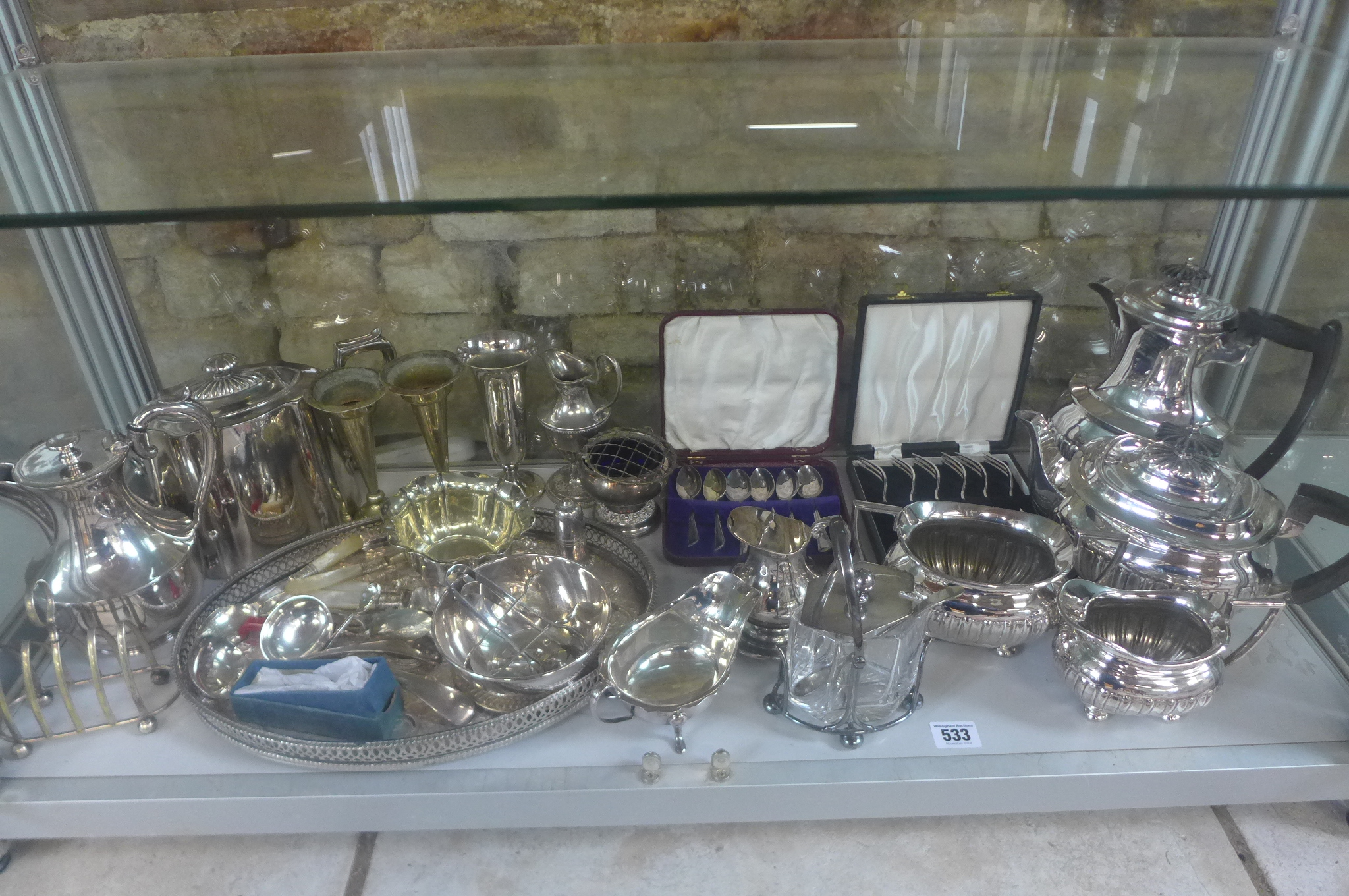 A collection of silver plated items, to include a four piece Walker and Hall tea set - some wear and