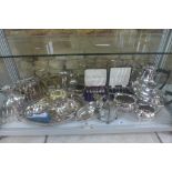 A collection of silver plated items, to include a four piece Walker and Hall tea set - some wear and