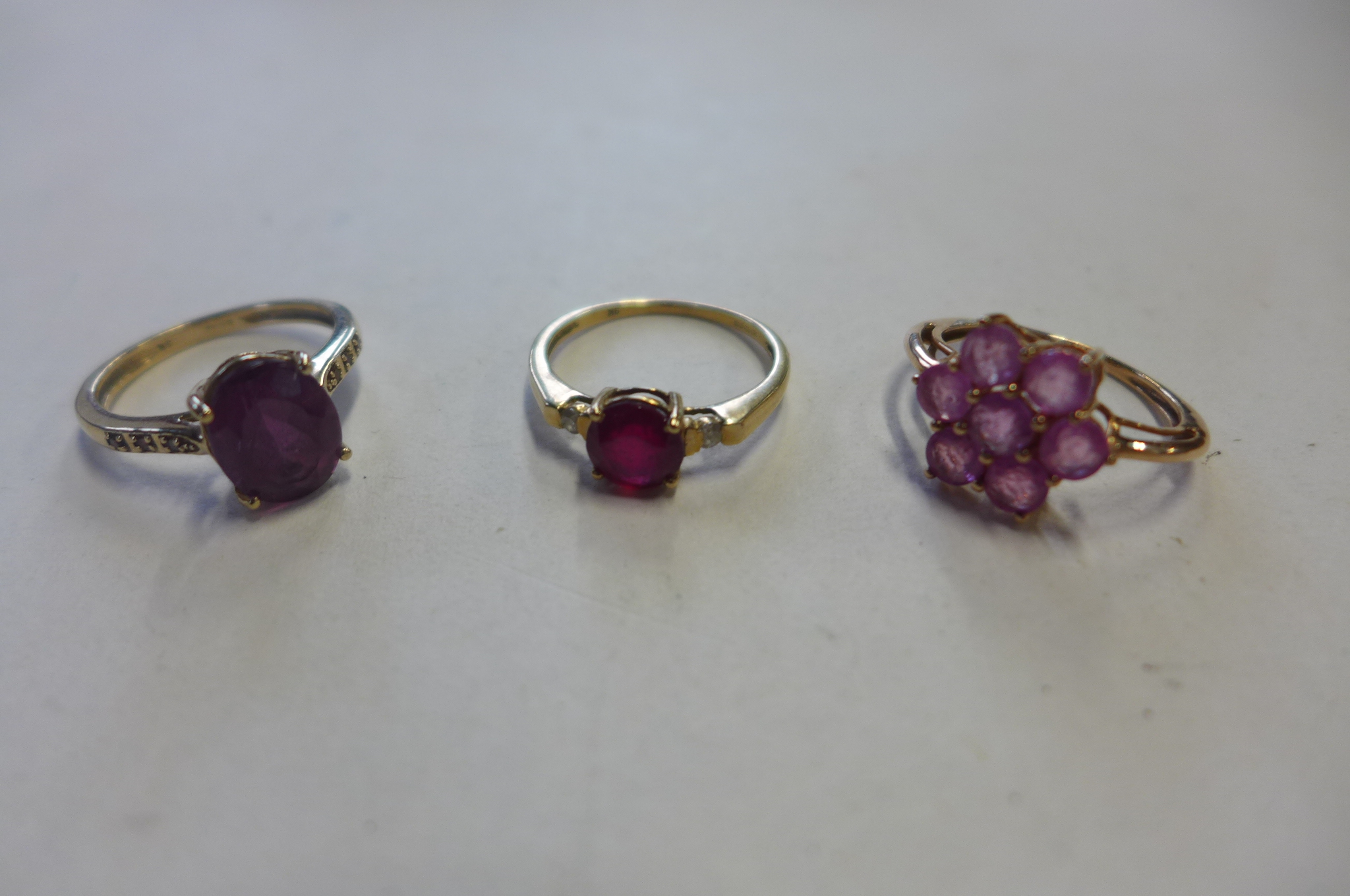 Three 9ct gold dress rings, sizes N, approx 6.7 grams, all in good condition