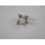 A pair of platinum and diamond stud earrings, each approx 0.20ct, total 1.9 grams,