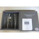 A boxed pair of Waterford Crystal Millennium toasting flutes 'second toast love' - boxed, unused