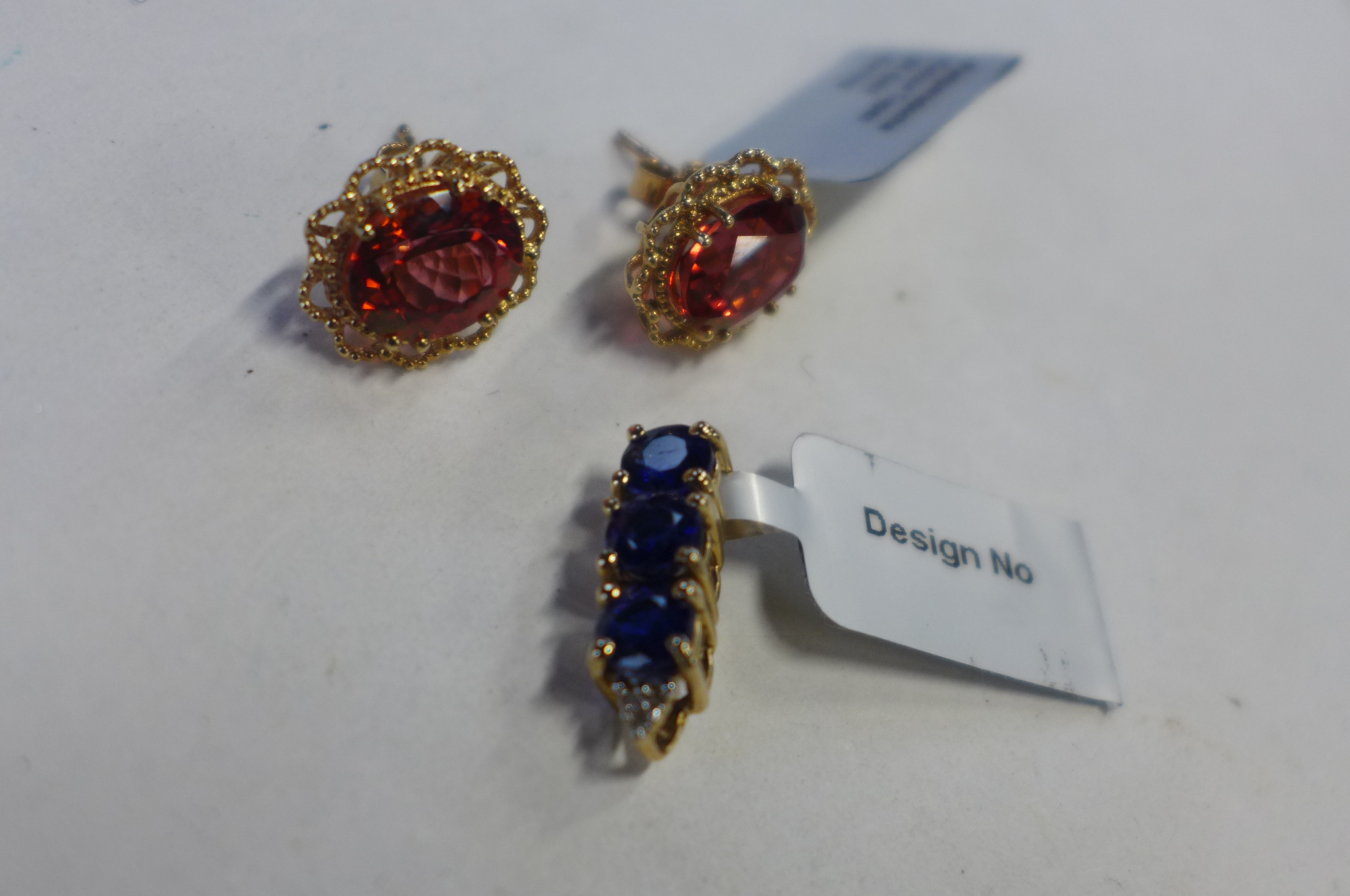 A pair of 9ct gold topaz earrings, total approx 6.3cts, and a Kyanite and diamond 9ct pendant,