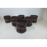 A set of six leather and straw work tumblers, 7cm tall x 7cm diameter, possibly African