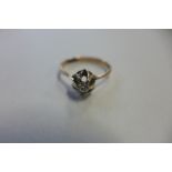 A Russian rose gold diamond solitaire ring, with Russian hallmark and stamped 583, Russian