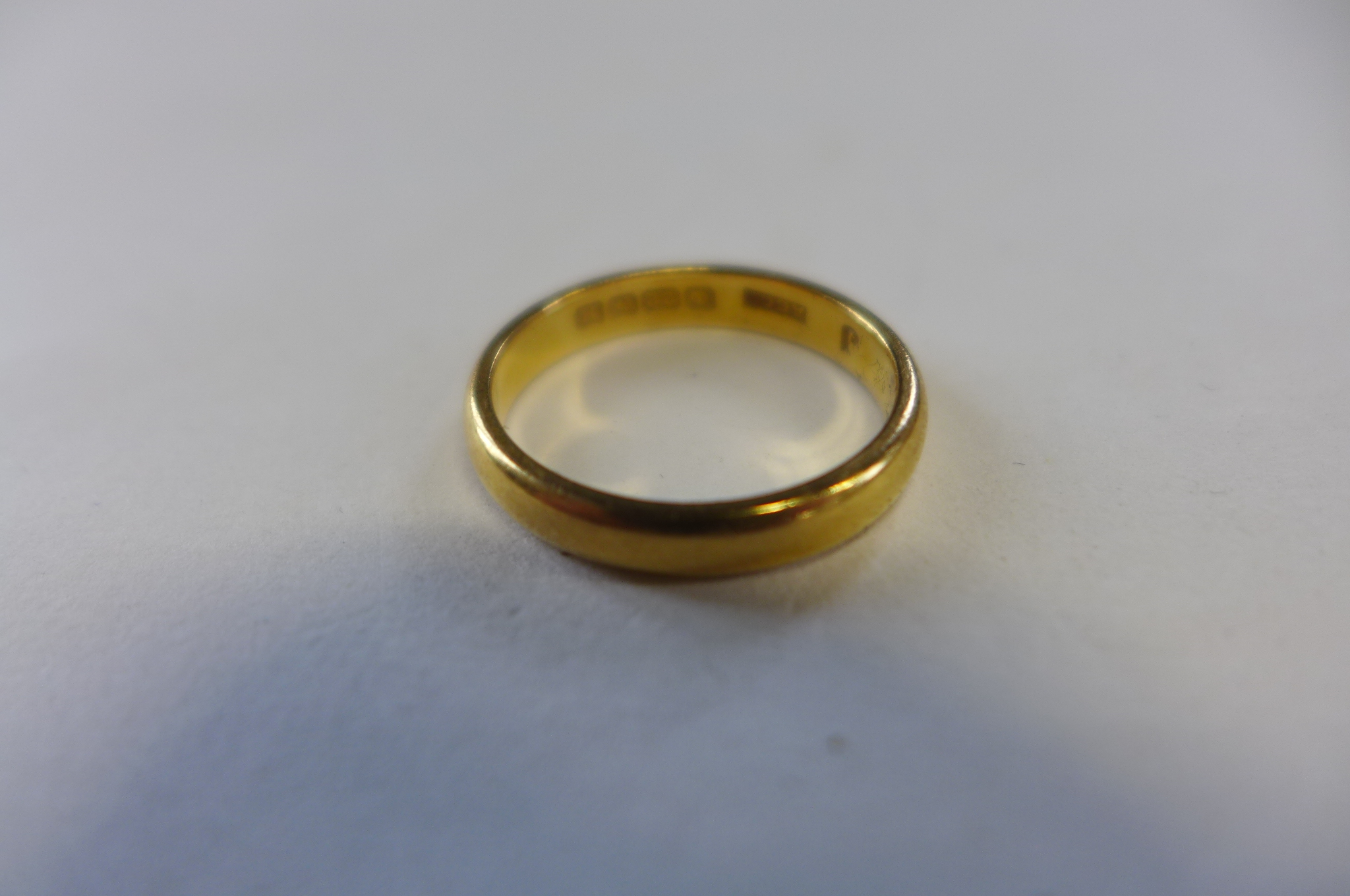 A 22ct wedding band, weight 3.9 grams, ring size L, clean condition