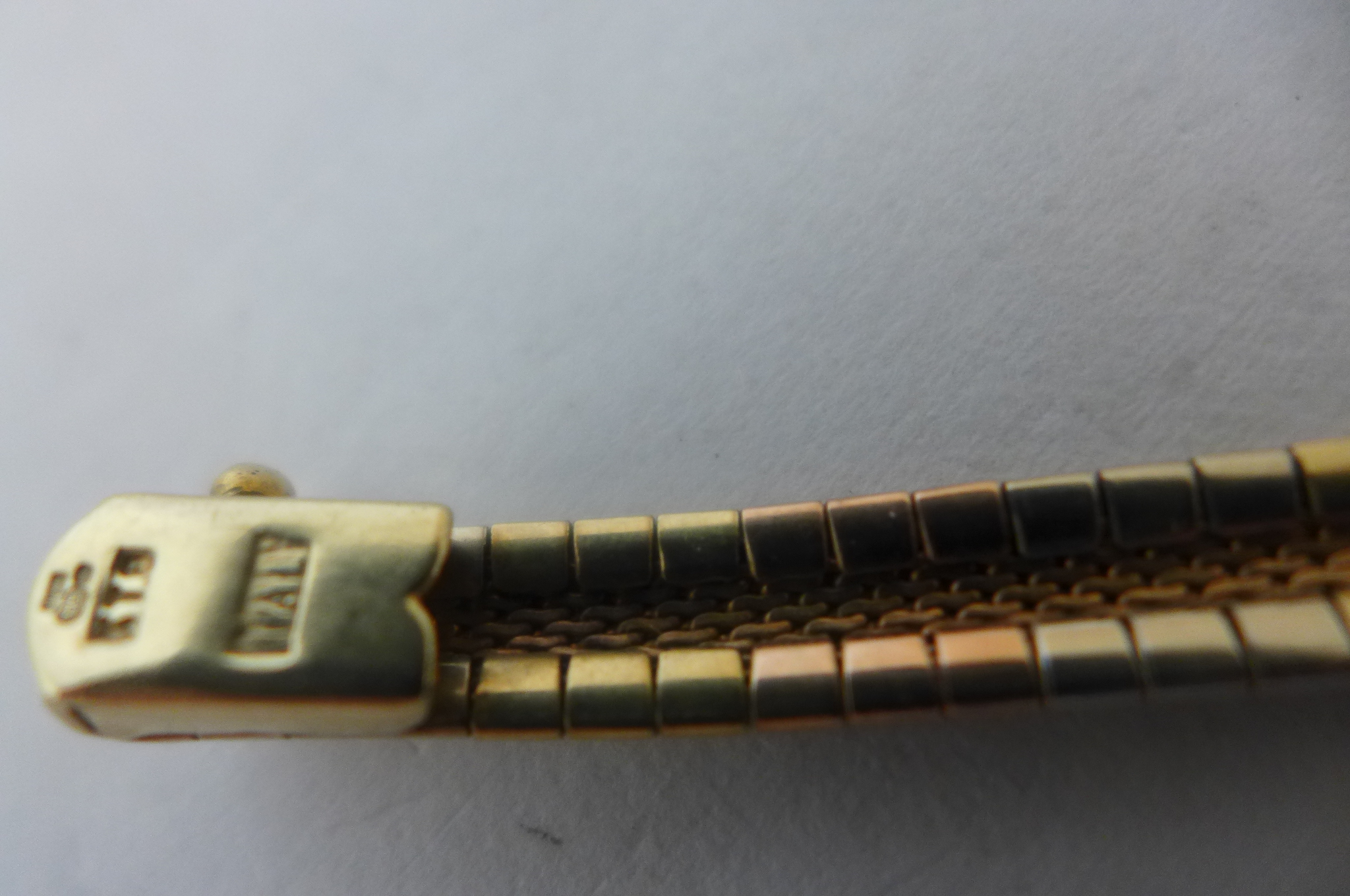 A tri-colour 9ct gold segmented and woven links with diamond design bracelet, import duty marks - Image 3 of 3