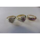 A hallmarked 9ct gold ring, approx 2.4 grams, and two unmarked gilt rings, approx 5.3 grams