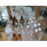 A collection of approx 45 glass chemist bottle and stoppers