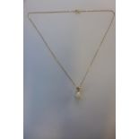 A hallmarked 9ct opal and diamond pendant on 9ct chain, marked 9KT, 44cm long, approx 2.9 grams,