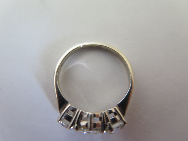 A three stone diamond trilogy ring set in 18ct white gold, approx 1.75ct total, size M, marked 18K - Image 3 of 6