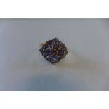 A 9ct tanzanite and diamond cluster ring, marked 9K, size O/P, approx 3.3 grams, generally good