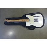 A Fender Telecaster Mexican made electric guitar with soft case and accessories, no MX12015939, in