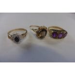 Three hallmarked 9ct gold rings - approx 7.5 grams