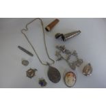 A cheroot holder, with 9ct rim, in a silver case, a silver charm bracelet and other assorted