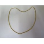 An 18ct yellow gold close curb link chain with trigger clasp, length 50cm, weight approx 16 grams,