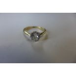 An 18ct yellow gold, hallmarked diamond solitaire ring, the diamond approx 1.00ct, ring size L,