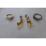 An 18ct ring, approx 1.5 grams, 9ct diamond ring, 2 grams, and a pair of 14ct earrings