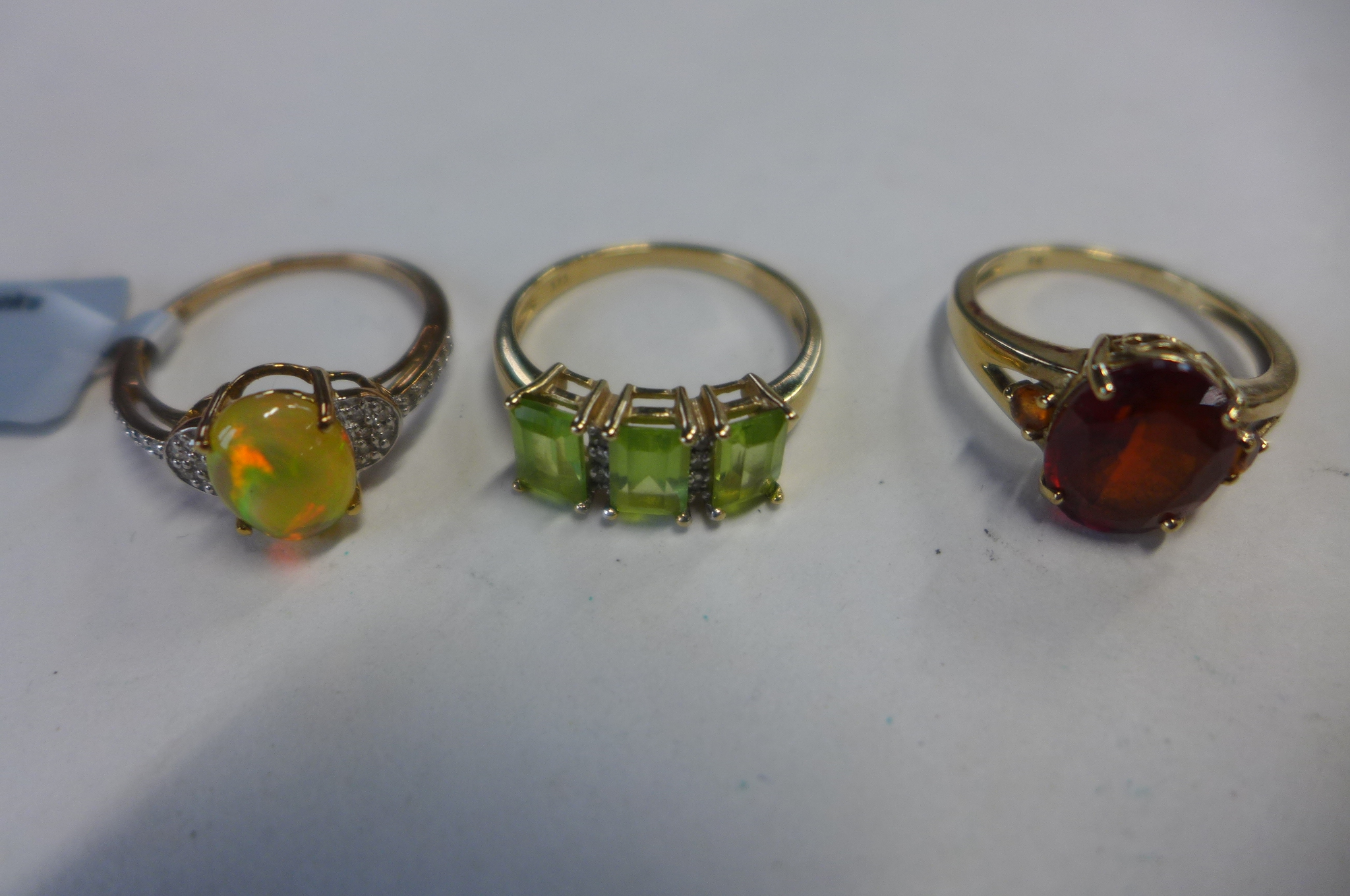 Three 9ct gold rings, sizes N and O, approx total weight 7.6 grams, all good condition