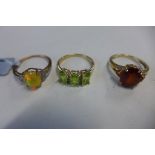 Three 9ct gold rings, sizes N and O, approx total weight 7.6 grams, all good condition