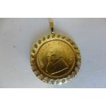 A quarter Krugerrand coin dated 1984 loosely held in a 9ct gold pendant mount, weight approx 10.7